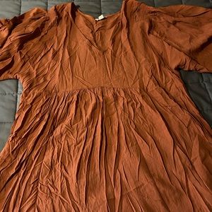 Women’s blouse; like new; orange in color